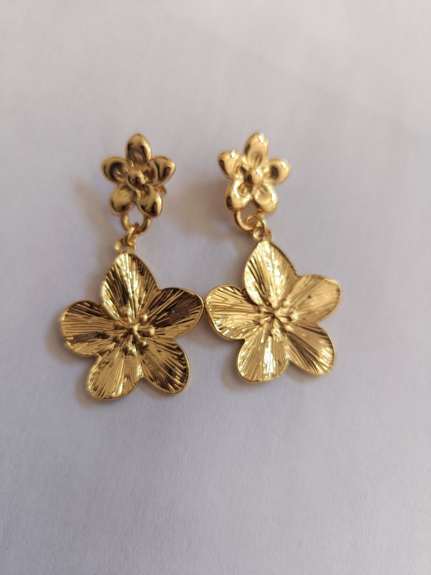 aretes flor